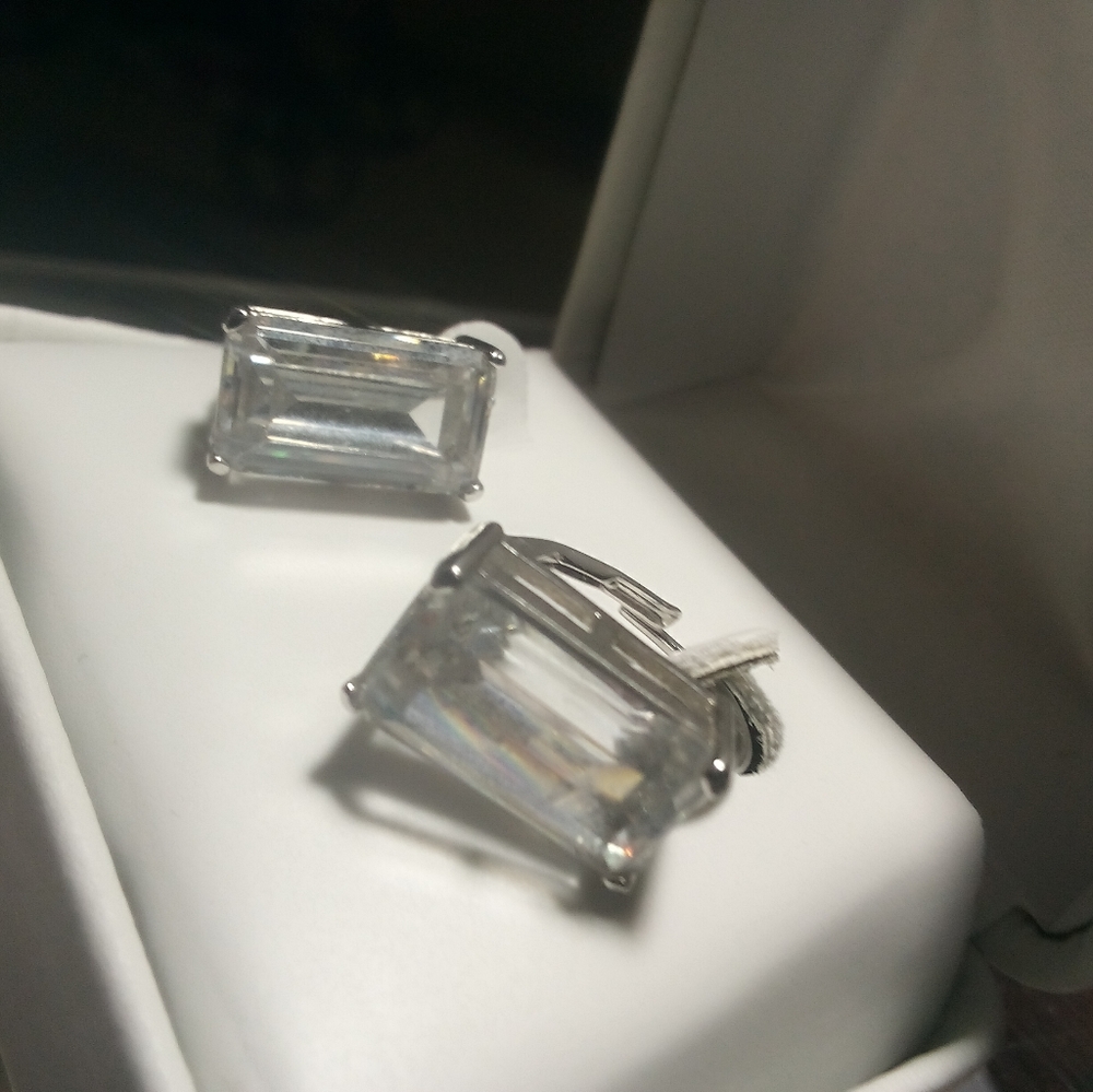 KJL Rock Crystal Recty cut earrings Signed KJL Rodium Plated apox 1/2 in.lenght